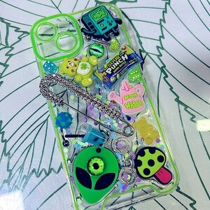 Handmade carefully thought of placements and trinkets IPhone14 pro phone case